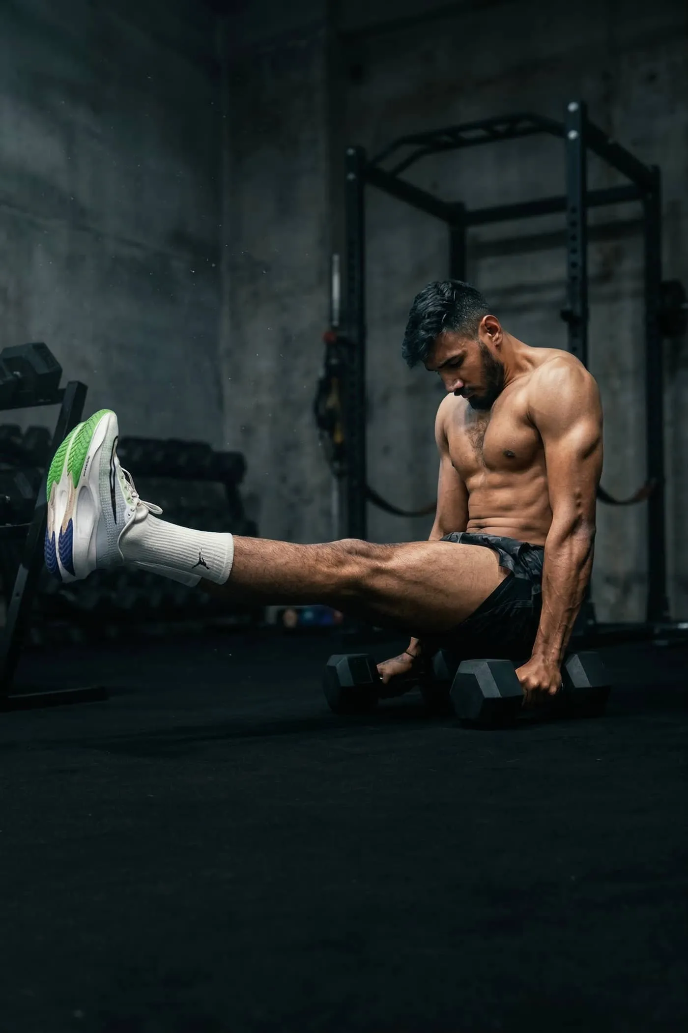 Maddy — core training, L-sit hold with dumbbells