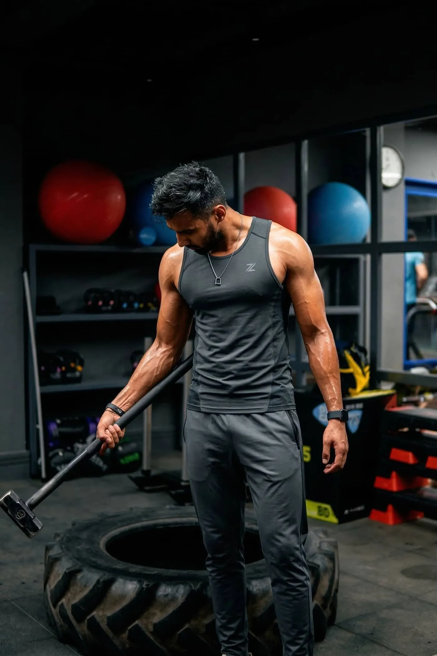 Maddy — strength training, sledgehammer tire work